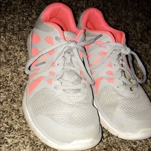 Grey and orange gym shoes